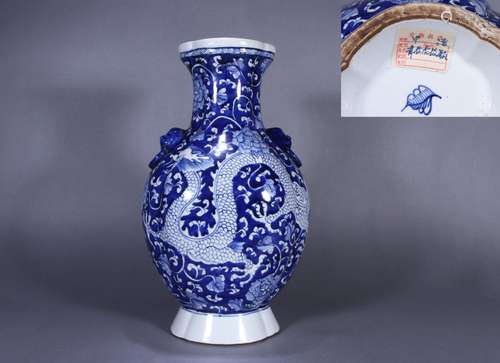 CHINESE PORCELAIN BLUE AND WHITE DRAGON HANDLED VASE