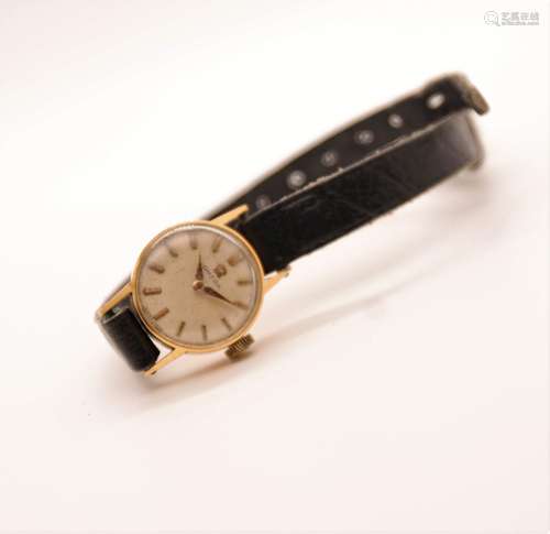 MONTRE DE FEMME OMEGA EN OR JAUNE<br />
Poinçon tête d'aigle...