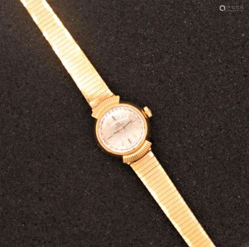 MONTRE DE FEMME OMEGA OR JAUNE<br />
Poinçon tête d'aigle<br...