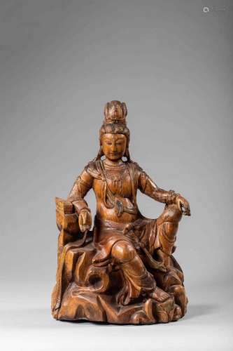 Le Boddhisattva Kwan Yin Avalokitésvara assis en délassement...
