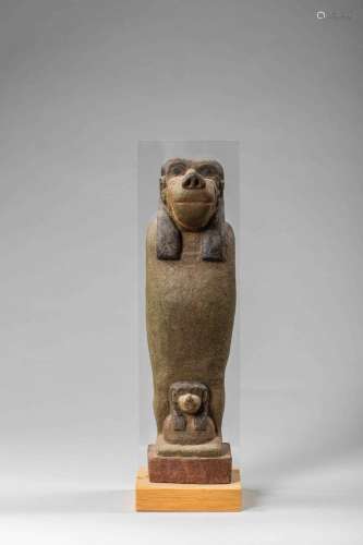 Thot, le dieu égyptien à tête  de babouin. Stuc polychrome. ...