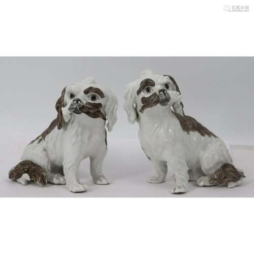 An Antique Pair of German Porcelain Dogs.