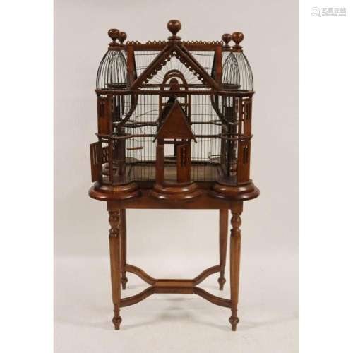 A Vintage Carved Mahogany Birdcage on Stand.
