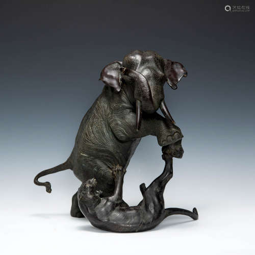 A Japanese bronze of a tiger and elephant, signed