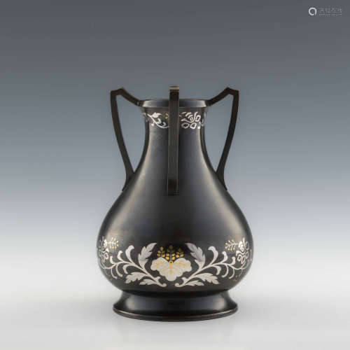 A Japanese bronze vase with gold and silver inlay