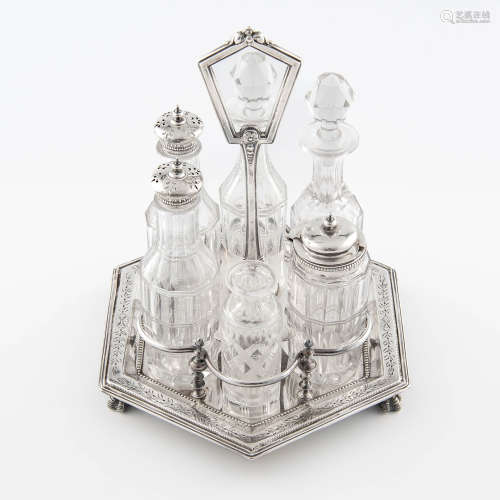 An English silver-plated and sterling silver cruet, Henry Ma...