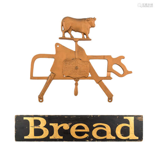 A cast iron butchers sign and a painted bread sign, Gloeckle...