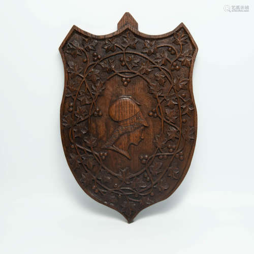 A Renaissance Revival carved oak shield, late 19th/early 20t...