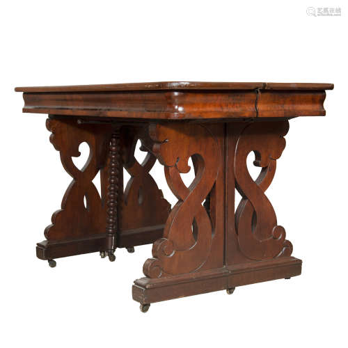 A Classical figured walnut concertina extension table, T.P. ...