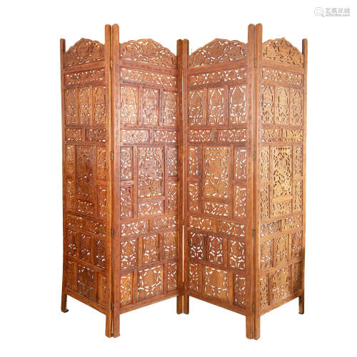 An Indian carved teakwood screen, 20th century