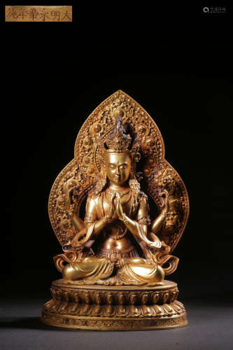 Gilt bronze four-armed Guanyin seated statue