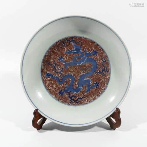 Blue and white underglaze red dragon plate