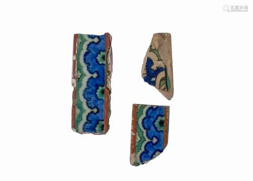 THREE EARLY IZNIK TILE FRAGMENTS, CIRCA 1520, 16TH CENTURY