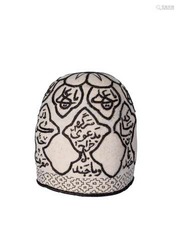 A QAJAR WHITE FELT DERVISH HAT WITH CALLIGRAPHY 19TH CENTURY