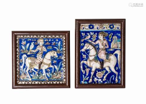 TWO QAJAR MOULDED TILE HORSE RIDER FRAMED PLAQUES, 19TH CENT...