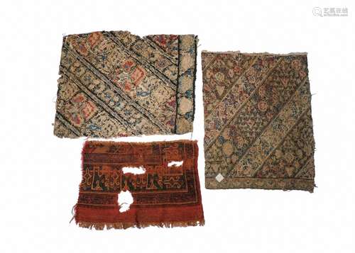 ASSORTMENT OF SAFAVID FLORAL TEXTILE FRAGMENTS, ONE WITH KUF...