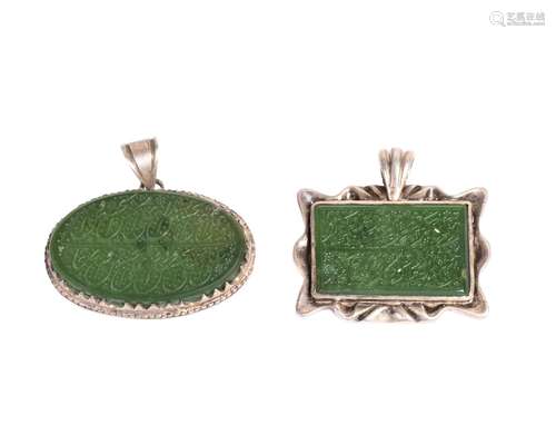 TWO ENGRAVED CALLIGRAPHY JADE PENDANTS SET ON SILVER, 19TH C...