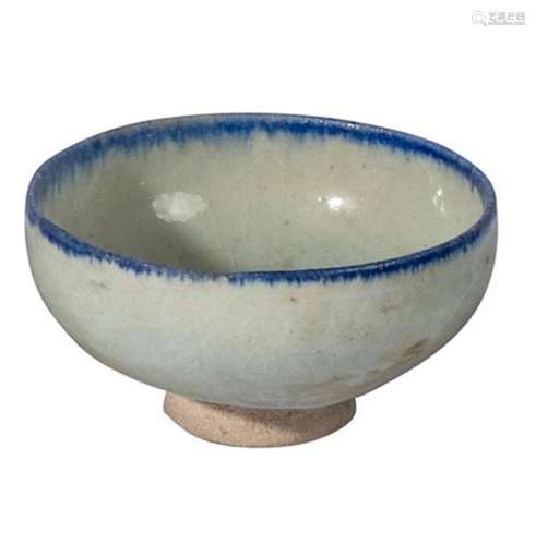 AN INTACT BLUE RIM WHITE LUSTRE POTTERY BOWL WITH CHINESE IN...