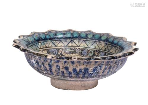 A SULTANABAD POTTERY BOWL WITH HARES, ILKHANID 13TH CENTURY