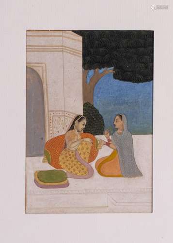 AN INDIAN MINIATURE OF TWO LADIES SITTING ON A MARBLE GROUND...