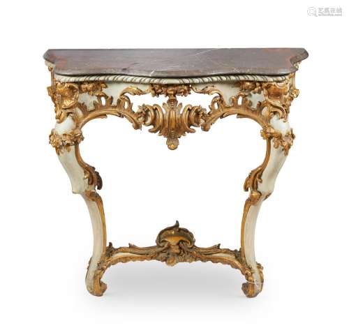 A CREAM PAINTED AND PARCEL GILT CONSOLE TABLE IN LOUIS XVI S...