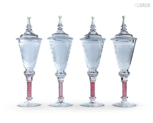 A SET OF FOUR ENGRAVED CONTINENTAL ARMORIAL GOBLETS  IN 18TH...
