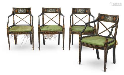 A SET OF FOUR EBONISED PARCEL GILT AND PAINTED ARMCHAIRS, CI...