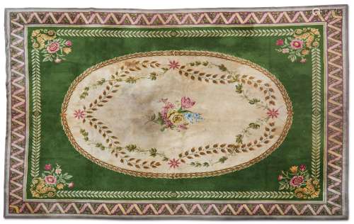 A MACHINE WOVEN CARPET OF AUBUSSON STYLE, DESIGNED BY OLIVER...
