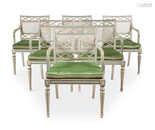 A SET OF EIGHTEEN CREAM AND GREEN PAINTED DINING CHAIRS, DES...