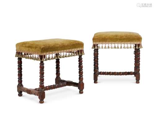 A PAIR OF WALNUT AND UPHOLSTERED STOOLS, MID 18TH CENTURY AN...