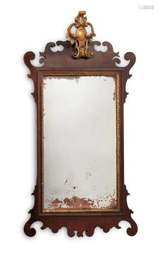 A MAHOGANY AND PARCEL GILT WALL MIRROR, CIRCA 1740 AND LATER