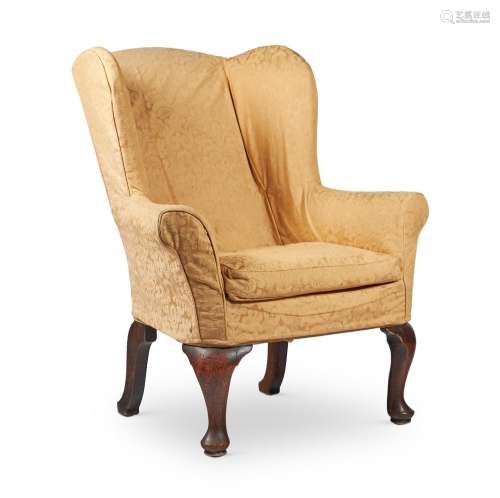 A PROVINCIAL STAINED OAK AND BEECH ARMCHAIR IN GEORGE II STY...