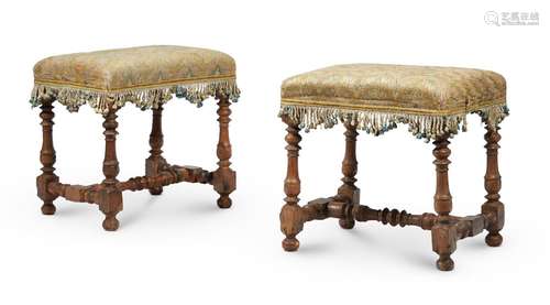 A PAIR OF WALNUT AND UPHOLSTERED RECTANGULAR STOOLS, EARLY 1...