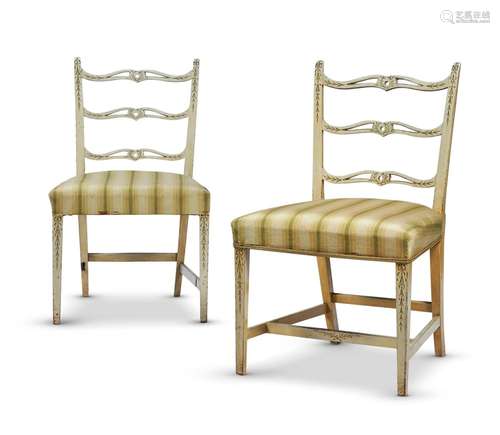 A PAIR OF SHORT LADDER BACK DINING CHAIRS IN GEORGE III STYL...