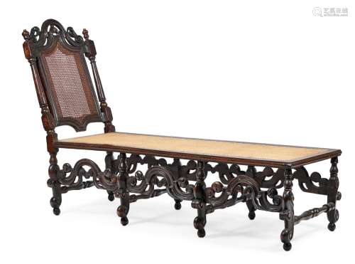 AN OAK DAY BED IN CHARLES II STYLE, INCORPORATING PERIOD ELE...