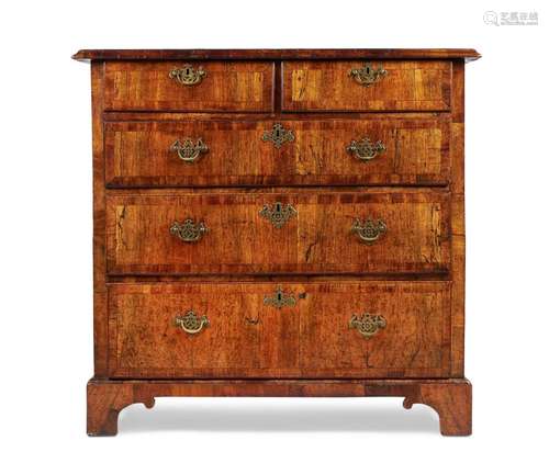 A GEORGE II WALNUT CHEST OF DRAWERS, CIRCA 1740