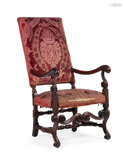 A CONTINENTAL WALNUT HIGH BACK ARMCHAIR, 18TH CENTURY