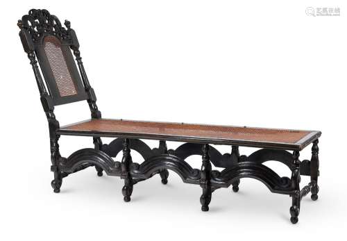 AN EBONISED AND CANEWORK DAY BED, LATE 17TH CENTURY AND LATE...