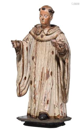 A polychrome limewood sculpture of Saint Francis of Assisi, ...