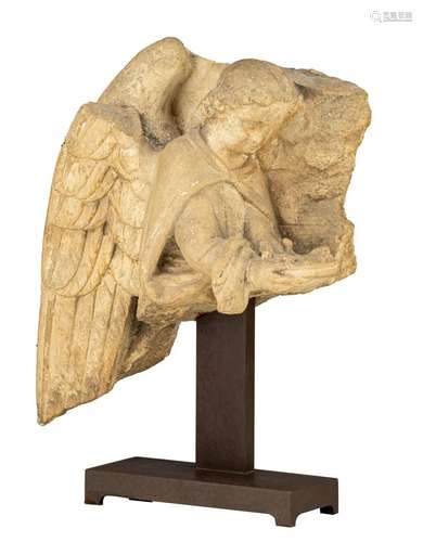 A limestone architectural fragment of an angel, in the Inter...