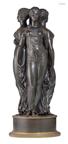 A Neoclassical patinated bronze sculpture of the three grace...