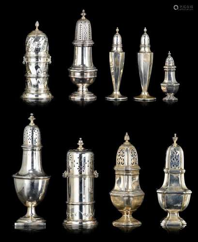 A collection of silver casters and salt shakers, H 10 - 21,5...