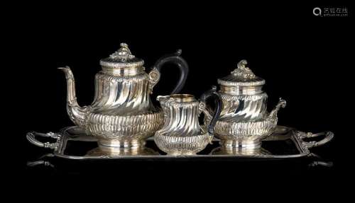 A Rococo Revival three-part silver coffee set with a matchin...