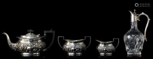 A three-part English eclectic silver coffee set, added a gla...