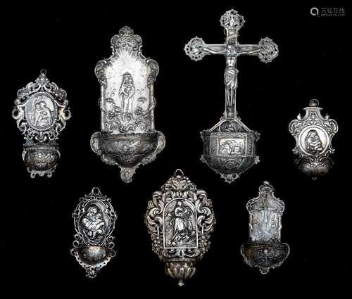 A collection of seven holy water fonts, H 12 - 26 cm, total ...