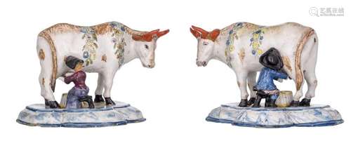 A pair of Amsterdam polychrome models of cows with milkers, ...