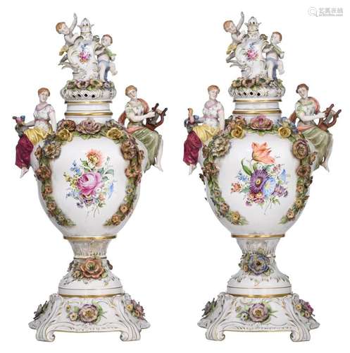 A large pair of Rococo-inspired Saxony porcelain vases and c...