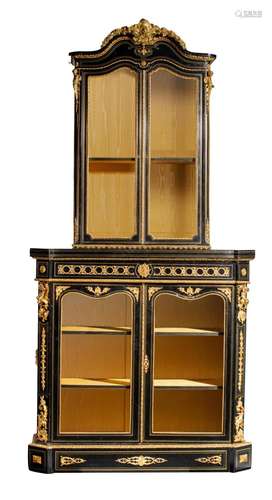 A large Napoleon III two-piece ebonised display cabinet, wit...