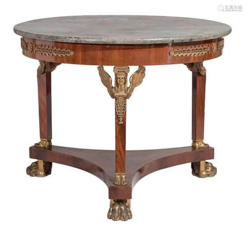 A fine Empire style gueridon, mahogany veneered with gilt br...