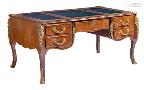 A Louis XV style mahogany veneered bureau plat with gilt bro...